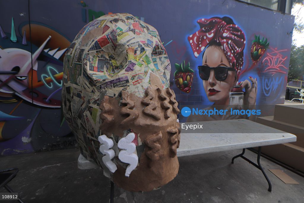 Artisans and members of the Última Hora collective manufacturing papier-mâché and metallic structures to build an allegorical float inspired by the classic Mexican song 'El panadero con el pan' ahead of Mexico City’s upcoming Day of the Dead parade, at the Faro de Oriente workshops in Iztapalapa. The annual cultural celebration brings together community artists and creators to showcase traditional Mexican folklore. on October 24, 2026 in Mexico City, Mexico. (Photo by Carlos Santiago/ Eyepix Group/Eyepix via Nexpher Images)