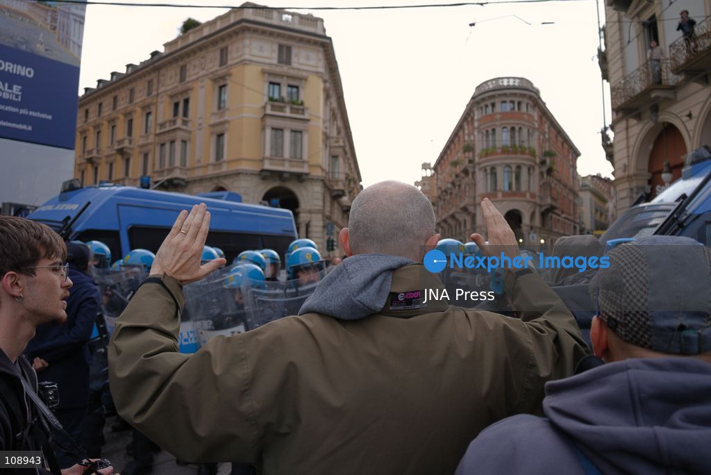TURIN, ITALY, OCTOBER 24, 2026: Riot police use water cannons and tear gas during confrontations with demonstrators protesting against military rearmament, rising living costs and government policies in Turin. The march begins in Piazza Castello before moving towards northern districts, with clashes occurring as police block protesters from entering streets leading towards the city centre. (Photo by Chiara Antenucci/JNA Press via Nexpher Images)