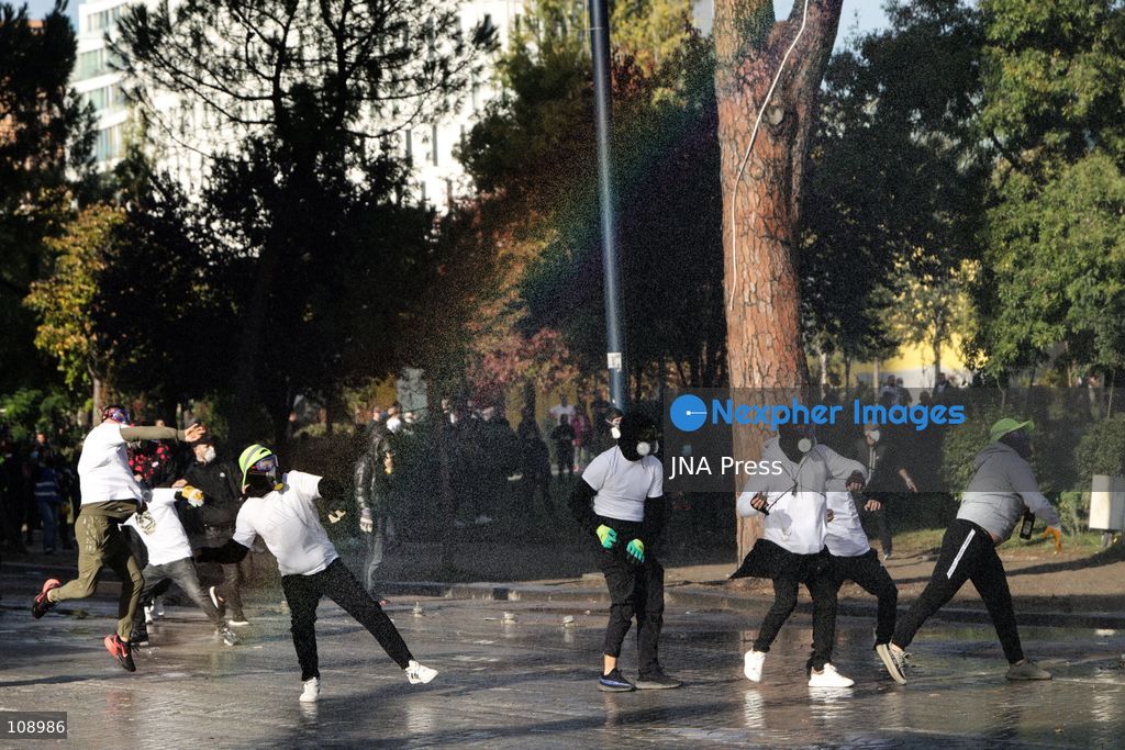 TIRANA, ALBANIA, OCTOBER 24, 2026: Demonstrators clash with riot police during an anti-government protest in central Tirana. Protesters throw stones, pyrotechnics and petrol bombs, while police use tear gas, water cannons and rubber bullets. The demonstrations call for Prime Minister Edi Rama’s resignation, increased support for education and greater political accountability. (Photo by Vlasov Sulaj/JNA Press via Nexpher Images)
