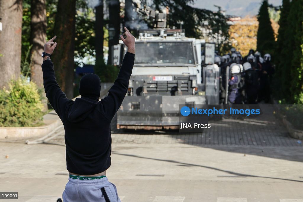 TIRANA, ALBANIA, OCTOBER 24, 2026: Demonstrators clash with riot police during an anti-government protest in central Tirana. Protesters throw stones, pyrotechnics and petrol bombs, while police use tear gas, water cannons and rubber bullets. The demonstrations call for Prime Minister Edi Rama’s resignation, increased support for education and greater political accountability. (Photo by Vlasov Sulaj/JNA Press via Nexpher Images)