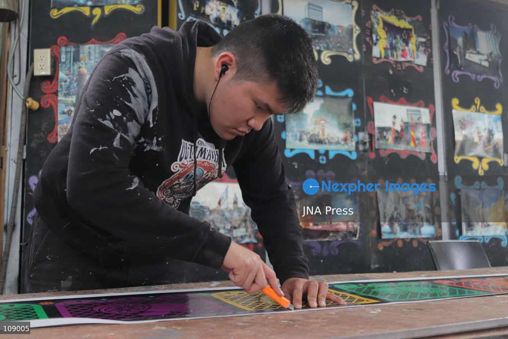 MEXICO CITY, MEXICO, OCTOBER 24, 2026: Members of the Última Hora collective work on “El Panadero con el Pan,” a float being built at FARO de Oriente in Iztapalapa for Mexico City’s Day of the Dead parade. The artists prepare the structure and decorative elements ahead of the annual celebration. (Photo by Carlos Santiago/JNA Press via Nexpher Images)