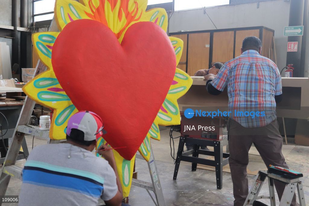 MEXICO CITY, MEXICO, OCTOBER 24, 2026: Members of the Última Hora collective work on “El Panadero con el Pan,” a float being built at FARO de Oriente in Iztapalapa for Mexico City’s Day of the Dead parade. The artists prepare the structure and decorative elements ahead of the annual celebration. (Photo by Carlos Santiago/JNA Press via Nexpher Images)