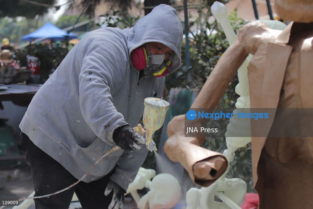 MEXICO CITY, MEXICO, OCTOBER 24, 2026: Members of the Última Hora collective work on “El Panadero con el Pan,” a float being built at FARO de Oriente in Iztapalapa for Mexico City’s Day of the Dead parade. The artists prepare the structure and decorative elements ahead of the annual celebration. (Photo by Carlos Santiago/JNA Press via Nexpher Images)
