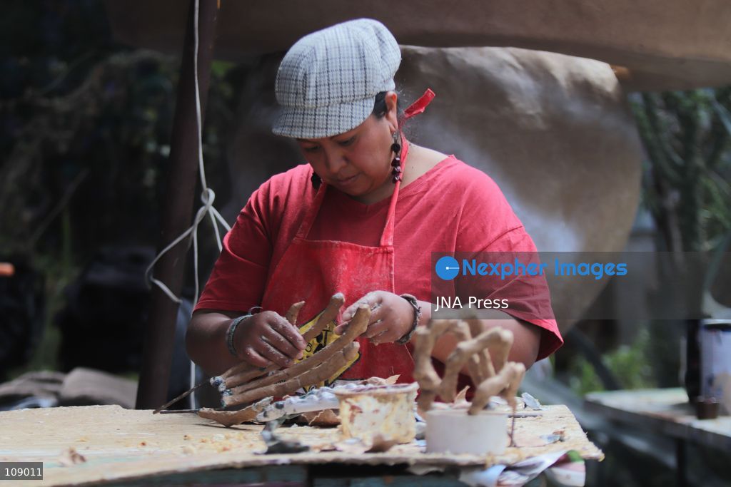 MEXICO CITY, MEXICO, OCTOBER 24, 2026: Members of the Última Hora collective work on “El Panadero con el Pan,” a float being built at FARO de Oriente in Iztapalapa for Mexico City’s Day of the Dead parade. The artists prepare the structure and decorative elements ahead of the annual celebration. (Photo by Carlos Santiago/JNA Press via Nexpher Images)