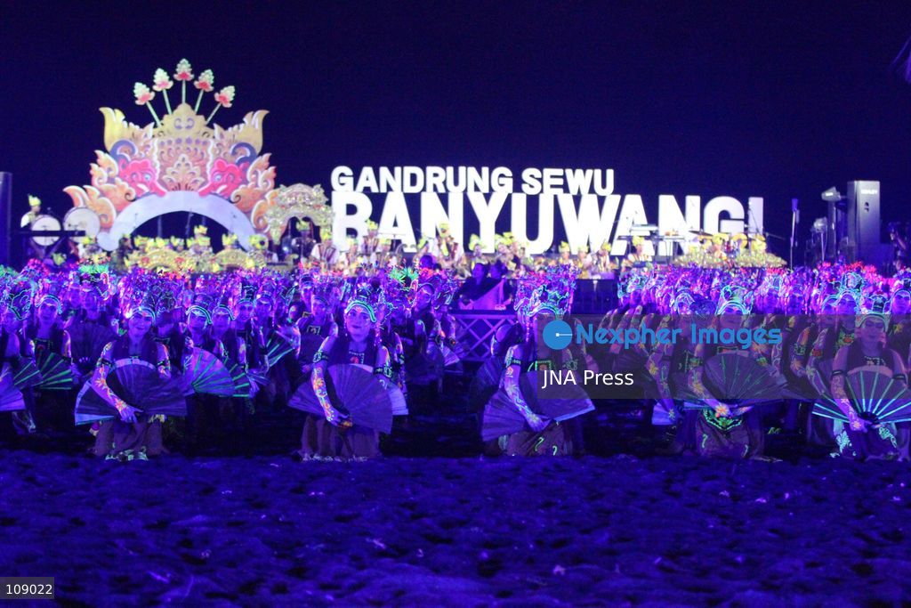 BANYUWANGI, INDONESIA, OCTOBER 24, 2026: Dancers perform during the Gandrung Sewu festival at Marina Boom Beach in Banyuwangi, East Java. Held at night for the first time, the mass dance performance combines traditional Gandrung choreography with illuminated costumes and lighting effects, highlighting the cultural heritage of the local Osing community. (Photo by Suharto/JNA Press via Nexpher Images)