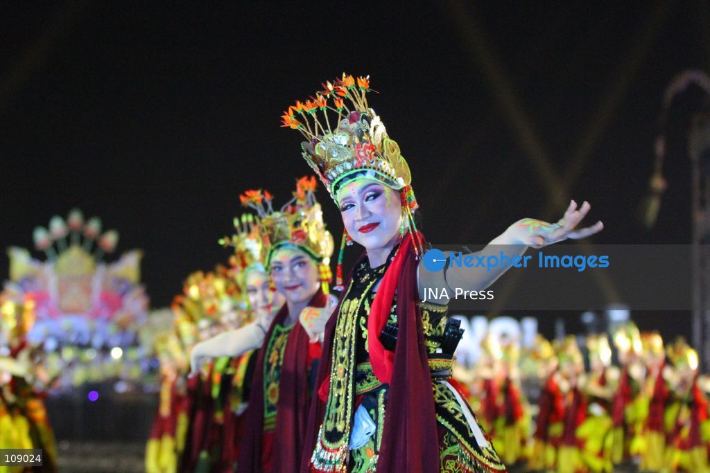 BANYUWANGI, INDONESIA, OCTOBER 24, 2026: Dancers perform during the Gandrung Sewu festival at Marina Boom Beach in Banyuwangi, East Java. Held at night for the first time, the mass dance performance combines traditional Gandrung choreography with illuminated costumes and lighting effects, highlighting the cultural heritage of the local Osing community. (Photo by Suharto/JNA Press via Nexpher Images)