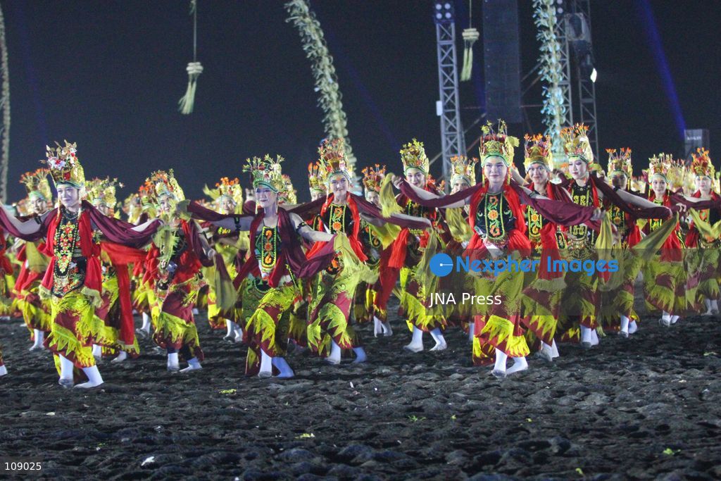 BANYUWANGI, INDONESIA, OCTOBER 24, 2026: Dancers perform during the Gandrung Sewu festival at Marina Boom Beach in Banyuwangi, East Java. Held at night for the first time, the mass dance performance combines traditional Gandrung choreography with illuminated costumes and lighting effects, highlighting the cultural heritage of the local Osing community. (Photo by Suharto/JNA Press via Nexpher Images)