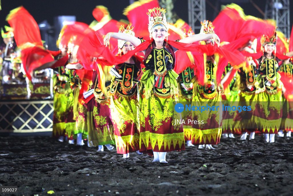 BANYUWANGI, INDONESIA, OCTOBER 24, 2026: Dancers perform during the Gandrung Sewu festival at Marina Boom Beach in Banyuwangi, East Java. Held at night for the first time, the mass dance performance combines traditional Gandrung choreography with illuminated costumes and lighting effects, highlighting the cultural heritage of the local Osing community. (Photo by Suharto/JNA Press via Nexpher Images)