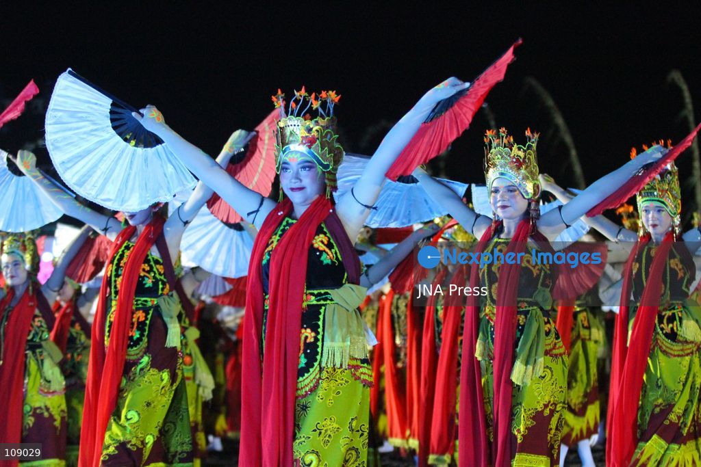 BANYUWANGI, INDONESIA, OCTOBER 24, 2026: Dancers perform during the Gandrung Sewu festival at Marina Boom Beach in Banyuwangi, East Java. Held at night for the first time, the mass dance performance combines traditional Gandrung choreography with illuminated costumes and lighting effects, highlighting the cultural heritage of the local Osing community. (Photo by Suharto/JNA Press via Nexpher Images)