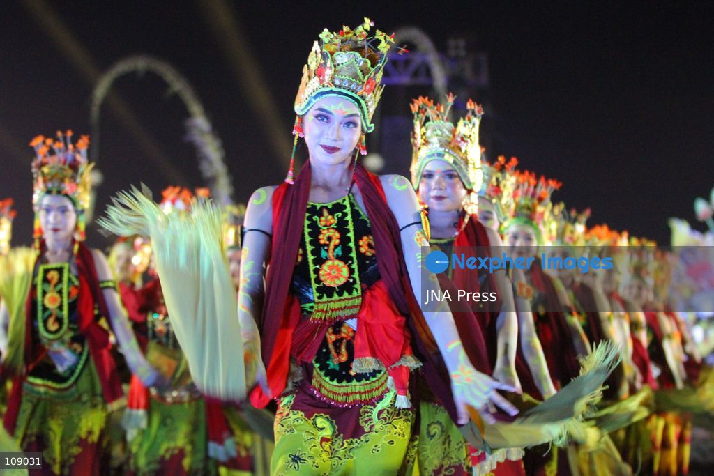 BANYUWANGI, INDONESIA, OCTOBER 24, 2026: Dancers perform during the Gandrung Sewu festival at Marina Boom Beach in Banyuwangi, East Java. Held at night for the first time, the mass dance performance combines traditional Gandrung choreography with illuminated costumes and lighting effects, highlighting the cultural heritage of the local Osing community. (Photo by Suharto/JNA Press via Nexpher Images)