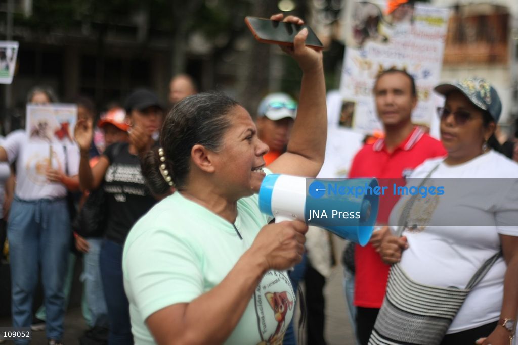 CARACAS, VENEZUELA, OCTOBER 24, 2026: Animal rights activists demonstrate in Caracas, calling for stronger legislation against animal abuse and justice for animals harmed or killed across Venezuela. Participants demand tougher penalties for offenders and greater action by authorities to investigate complaints and protect animals. (Photo by Moisés Quintero/JNA Press via Nexpher Images)