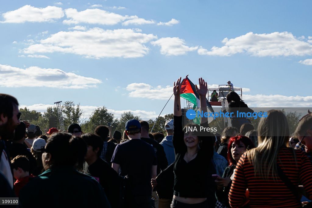 WASHINGTON, D.C., UNITED STATES, OCTOBER 24, 2026: Concertgoers gather on the Washington Monument grounds for a free benefit concert by American band Turnstile. The event raises donations for Human Concern International’s humanitarian relief efforts in Palestine, Sudan and Lebanon. (Photo by Ariel Peña/JNA Press via Nexpher Images)