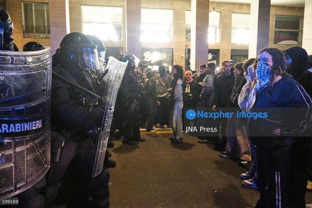 BOLOGNA, ITALY - OCTOBER 24, 2026: Thousands of people gathered spontaneously in Piazza del Nettuno before setting off in a march through the city centre. Clashes broke out along Via Marconi. Several people were injured, and a young man lost consciousness after being tackled by police. A police water cannon was also used from behind the protesters and hit the ambulance that was assisting the unconscious man. In protest, demonstrators sat down in front of the police line, which, after several minutes, decided to disband its wall of shields. (Photo by Lorenzo Pasini/JNA Press via Nexpher Images)