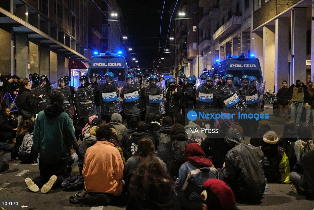 BOLOGNA, ITALY - OCTOBER 24, 2026: Thousands of people gathered spontaneously in Piazza del Nettuno before setting off in a march through the city centre. Clashes broke out along Via Marconi. Several people were injured, and a young man lost consciousness after being tackled by police. A police water cannon was also used from behind the protesters and hit the ambulance that was assisting the unconscious man. In protest, demonstrators sat down in front of the police line, which, after several minutes, decided to disband its wall of shields. (Photo by Lorenzo Pasini/JNA Press via Nexpher Images)