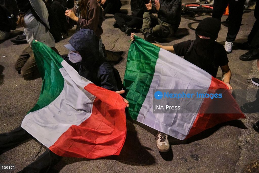 BOLOGNA, ITALY - OCTOBER 24, 2026: Thousands of people gathered spontaneously in Piazza del Nettuno before setting off in a march through the city centre. Clashes broke out along Via Marconi. Several people were injured, and a young man lost consciousness after being tackled by police. A police water cannon was also used from behind the protesters and hit the ambulance that was assisting the unconscious man. In protest, demonstrators sat down in front of the police line, which, after several minutes, decided to disband its wall of shields. (Photo by Lorenzo Pasini/JNA Press via Nexpher Images)