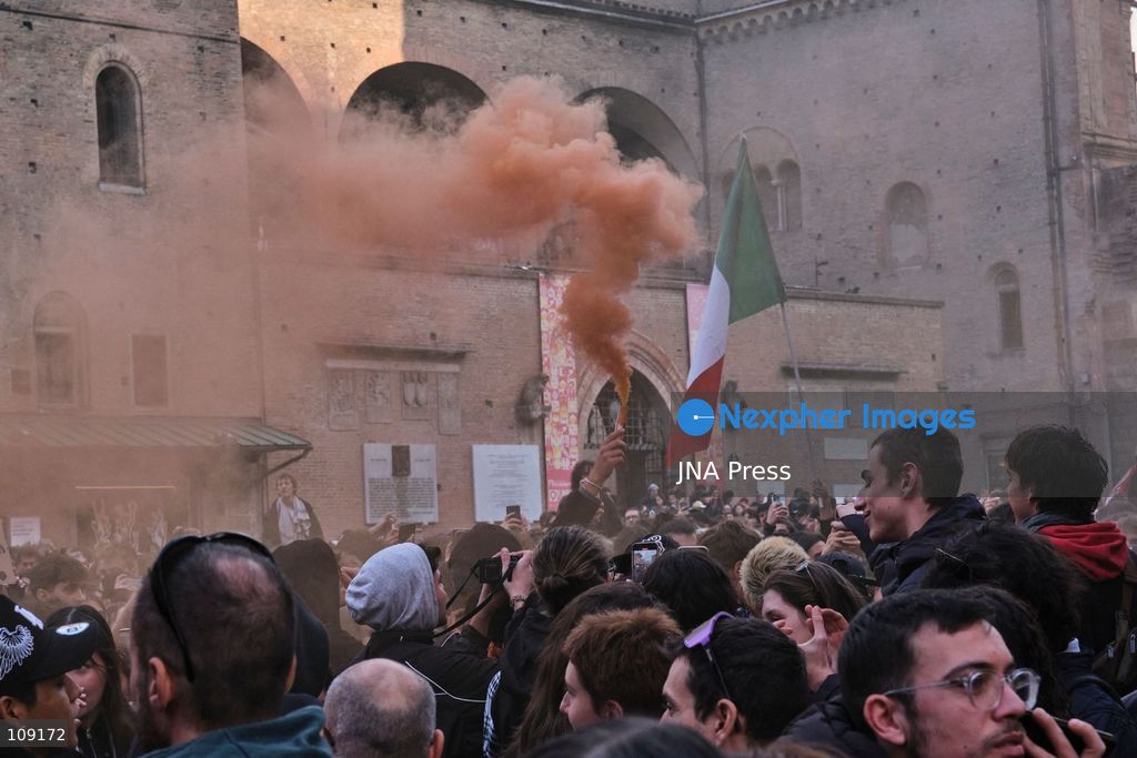 BOLOGNA, ITALY - OCTOBER 24, 2026: Thousands of people gathered spontaneously in Piazza del Nettuno before setting off in a march through the city centre. Clashes broke out along Via Marconi. Several people were injured, and a young man lost consciousness after being tackled by police. A police water cannon was also used from behind the protesters and hit the ambulance that was assisting the unconscious man. In protest, demonstrators sat down in front of the police line, which, after several minutes, decided to disband its wall of shields. (Photo by Lorenzo Pasini/JNA Press via Nexpher Images)
