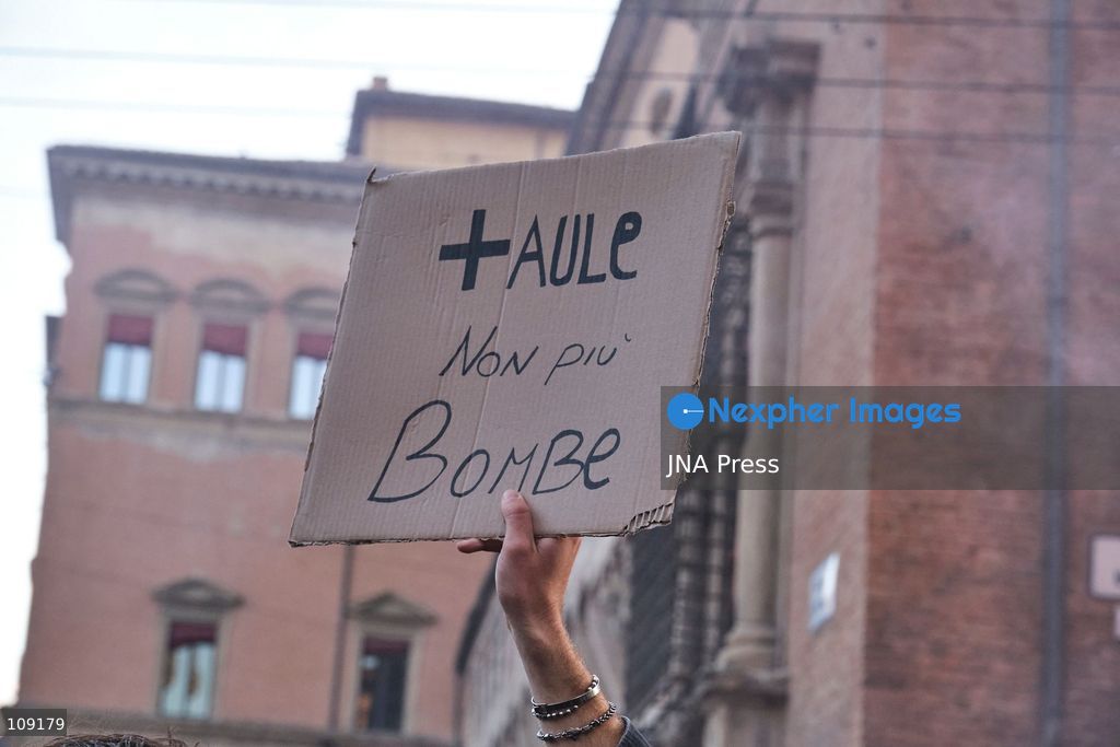 BOLOGNA, ITALY - OCTOBER 24, 2026: Thousands of people gathered spontaneously in Piazza del Nettuno before setting off in a march through the city centre. Clashes broke out along Via Marconi. Several people were injured, and a young man lost consciousness after being tackled by police. A police water cannon was also used from behind the protesters and hit the ambulance that was assisting the unconscious man. In protest, demonstrators sat down in front of the police line, which, after several minutes, decided to disband its wall of shields. (Photo by Lorenzo Pasini/JNA Press via Nexpher Images)