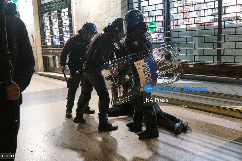 BOLOGNA, ITALY - OCTOBER 24, 2026: Thousands of people gathered spontaneously in Piazza del Nettuno before setting off in a march through the city centre. Clashes broke out along Via Marconi. Several people were injured, and a young man lost consciousness after being tackled by police. A police water cannon was also used from behind the protesters and hit the ambulance that was assisting the unconscious man. In protest, demonstrators sat down in front of the police line, which, after several minutes, decided to disband its wall of shields. (Photo by Lorenzo Pasini/JNA Press via Nexpher Images)