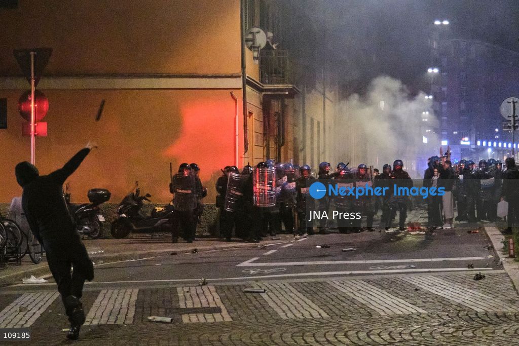 BOLOGNA, ITALY - OCTOBER 24, 2026: Thousands of people gathered spontaneously in Piazza del Nettuno before setting off in a march through the city centre. Clashes broke out along Via Marconi. Several people were injured, and a young man lost consciousness after being tackled by police. A police water cannon was also used from behind the protesters and hit the ambulance that was assisting the unconscious man. In protest, demonstrators sat down in front of the police line, which, after several minutes, decided to disband its wall of shields. (Photo by Lorenzo Pasini/JNA Press via Nexpher Images)