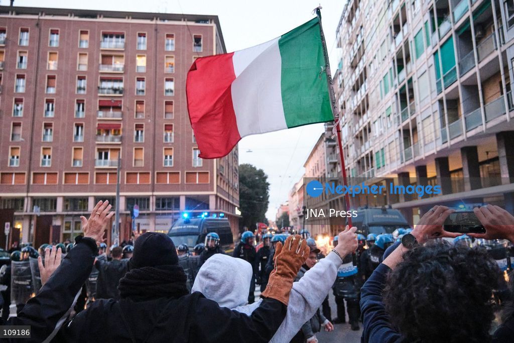 BOLOGNA, ITALY - OCTOBER 24, 2026: Thousands of people gathered spontaneously in Piazza del Nettuno before setting off in a march through the city centre. Clashes broke out along Via Marconi. Several people were injured, and a young man lost consciousness after being tackled by police. A police water cannon was also used from behind the protesters and hit the ambulance that was assisting the unconscious man. In protest, demonstrators sat down in front of the police line, which, after several minutes, decided to disband its wall of shields. (Photo by Lorenzo Pasini/JNA Press via Nexpher Images)