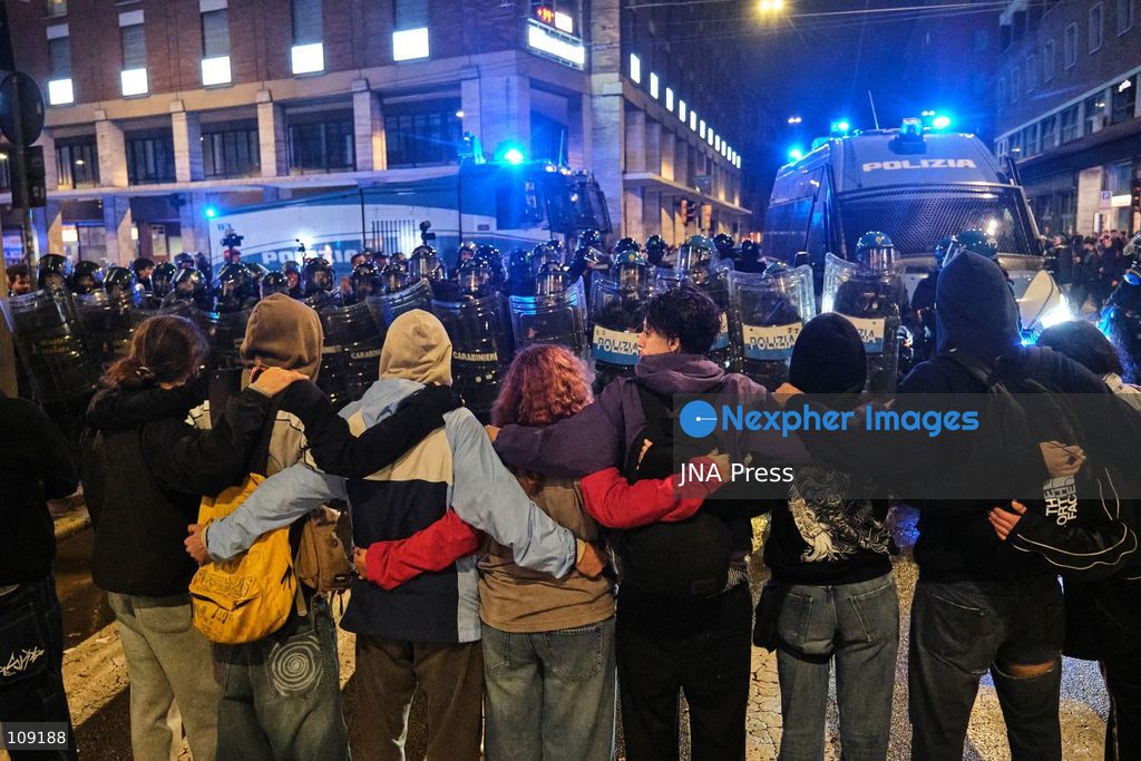 BOLOGNA, ITALY - OCTOBER 24, 2026: Thousands of people gathered spontaneously in Piazza del Nettuno before setting off in a march through the city centre. Clashes broke out along Via Marconi. Several people were injured, and a young man lost consciousness after being tackled by police. A police water cannon was also used from behind the protesters and hit the ambulance that was assisting the unconscious man. In protest, demonstrators sat down in front of the police line, which, after several minutes, decided to disband its wall of shields. (Photo by Lorenzo Pasini/JNA Press via Nexpher Images)