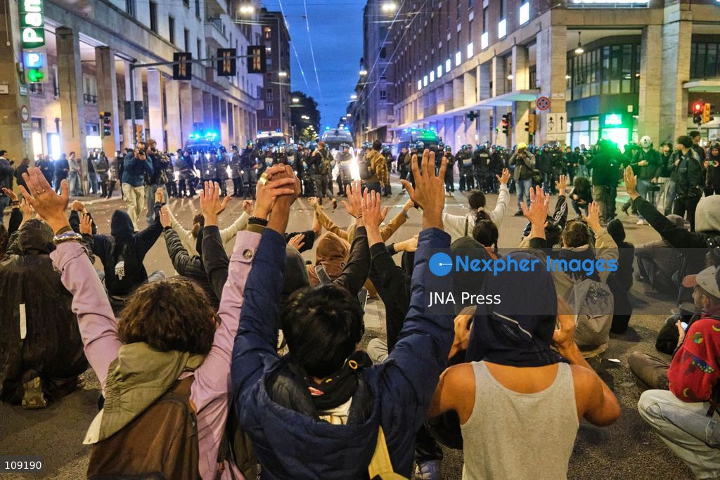 BOLOGNA, ITALY - OCTOBER 24, 2026: Thousands of people gathered spontaneously in Piazza del Nettuno before setting off in a march through the city centre. Clashes broke out along Via Marconi. Several people were injured, and a young man lost consciousness after being tackled by police. A police water cannon was also used from behind the protesters and hit the ambulance that was assisting the unconscious man. In protest, demonstrators sat down in front of the police line, which, after several minutes, decided to disband its wall of shields. (Photo by Lorenzo Pasini/JNA Press via Nexpher Images)
