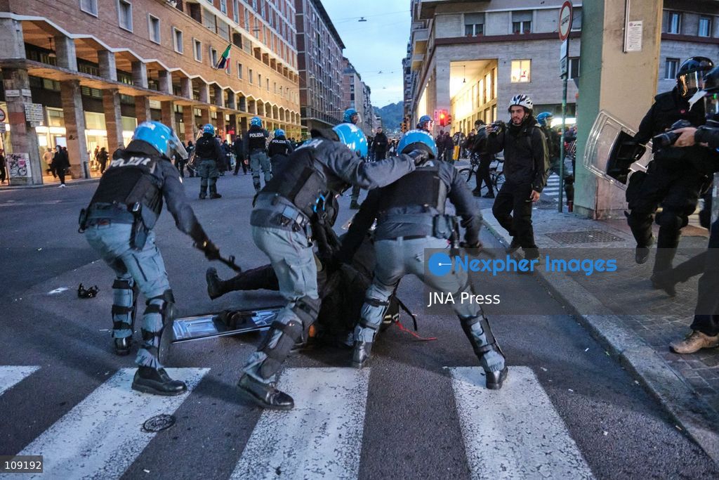 BOLOGNA, ITALY - OCTOBER 24, 2026: Thousands of people gathered spontaneously in Piazza del Nettuno before setting off in a march through the city centre. Clashes broke out along Via Marconi. Several people were injured, and a young man lost consciousness after being tackled by police. A police water cannon was also used from behind the protesters and hit the ambulance that was assisting the unconscious man. In protest, demonstrators sat down in front of the police line, which, after several minutes, decided to disband its wall of shields. (Photo by Lorenzo Pasini/JNA Press via Nexpher Images)