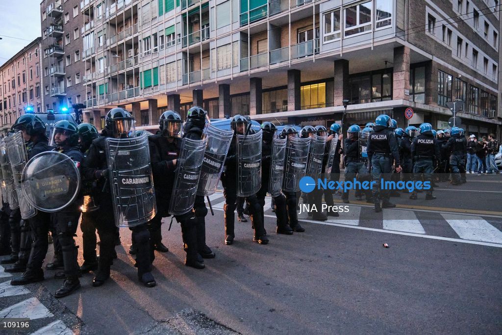 BOLOGNA, ITALY - OCTOBER 24, 2026: Thousands of people gathered spontaneously in Piazza del Nettuno before setting off in a march through the city centre. Clashes broke out along Via Marconi. Several people were injured, and a young man lost consciousness after being tackled by police. A police water cannon was also used from behind the protesters and hit the ambulance that was assisting the unconscious man. In protest, demonstrators sat down in front of the police line, which, after several minutes, decided to disband its wall of shields. (Photo by Lorenzo Pasini/JNA Press via Nexpher Images)