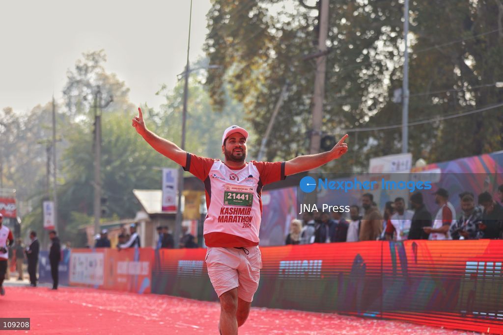 SRINAGAR, INDIA - OCTOBER 25, 2026: Participants run during the third edition of the Kashmir International Marathon in Srinagar, Jammu and Kashmir. Runners, including international athletes from 12 countries, take part in the event, which features a 42.195-kilometre full marathon and a 21-kilometre half marathon. The routes pass through scenic locations, including Dal Lake, Boulevard Road and Nishat Garden, highlighting Kashmir's natural beauty and growing potential for sports tourism. (Photo by Sameer Hussain/JNA Press via Nexpher Images)