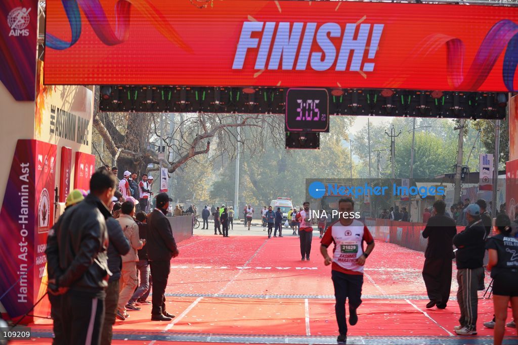 SRINAGAR, INDIA - OCTOBER 25, 2026: Participants run during the third edition of the Kashmir International Marathon in Srinagar, Jammu and Kashmir. Runners, including international athletes from 12 countries, take part in the event, which features a 42.195-kilometre full marathon and a 21-kilometre half marathon. The routes pass through scenic locations, including Dal Lake, Boulevard Road and Nishat Garden, highlighting Kashmir's natural beauty and growing potential for sports tourism. (Photo by Sameer Hussain/JNA Press via Nexpher Images)