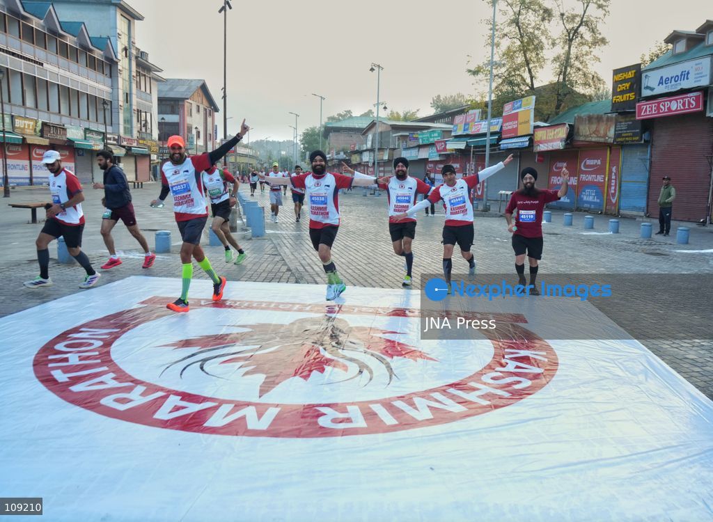 SRINAGAR, INDIA - OCTOBER 25, 2026: Participants run during the third edition of the Kashmir International Marathon in Srinagar, Jammu and Kashmir. Runners, including international athletes from 12 countries, take part in the event, which features a 42.195-kilometre full marathon and a 21-kilometre half marathon. The routes pass through scenic locations, including Dal Lake, Boulevard Road and Nishat Garden, highlighting Kashmir's natural beauty and growing potential for sports tourism. (Photo by Sameer Hussain/JNA Press via Nexpher Images)