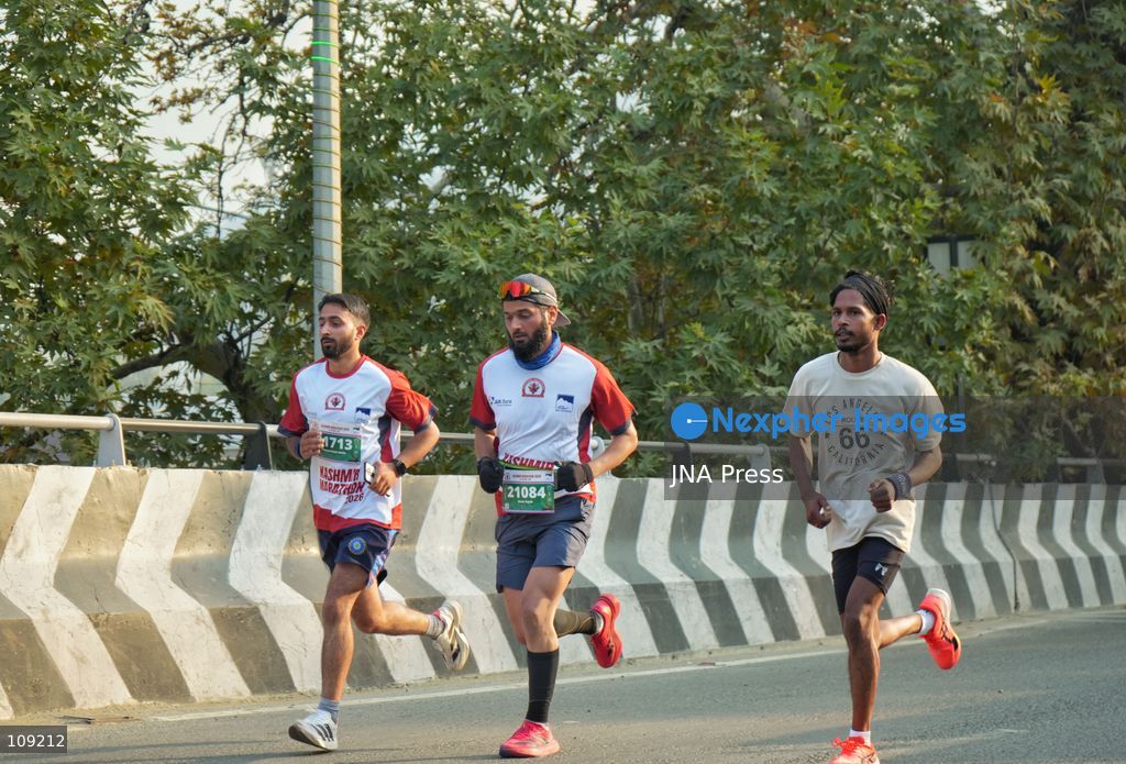 SRINAGAR, INDIA - OCTOBER 25, 2026: Participants run during the third edition of the Kashmir International Marathon in Srinagar, Jammu and Kashmir. Runners, including international athletes from 12 countries, take part in the event, which features a 42.195-kilometre full marathon and a 21-kilometre half marathon. The routes pass through scenic locations, including Dal Lake, Boulevard Road and Nishat Garden, highlighting Kashmir's natural beauty and growing potential for sports tourism. (Photo by Sameer Hussain/JNA Press via Nexpher Images)
