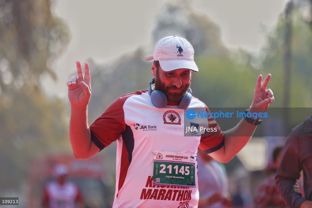 SRINAGAR, INDIA - OCTOBER 25, 2026: Participants run during the third edition of the Kashmir International Marathon in Srinagar, Jammu and Kashmir. Runners, including international athletes from 12 countries, take part in the event, which features a 42.195-kilometre full marathon and a 21-kilometre half marathon. The routes pass through scenic locations, including Dal Lake, Boulevard Road and Nishat Garden, highlighting Kashmir's natural beauty and growing potential for sports tourism. (Photo by Sameer Hussain/JNA Press via Nexpher Images)