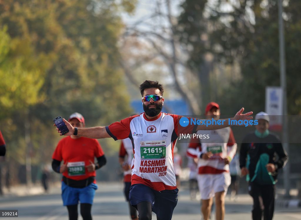 SRINAGAR, INDIA - OCTOBER 25, 2026: Participants run during the third edition of the Kashmir International Marathon in Srinagar, Jammu and Kashmir. Runners, including international athletes from 12 countries, take part in the event, which features a 42.195-kilometre full marathon and a 21-kilometre half marathon. The routes pass through scenic locations, including Dal Lake, Boulevard Road and Nishat Garden, highlighting Kashmir's natural beauty and growing potential for sports tourism. (Photo by Sameer Hussain/JNA Press via Nexpher Images)