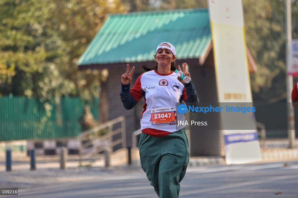 SRINAGAR, INDIA - OCTOBER 25, 2026: Participants run during the third edition of the Kashmir International Marathon in Srinagar, Jammu and Kashmir. Runners, including international athletes from 12 countries, take part in the event, which features a 42.195-kilometre full marathon and a 21-kilometre half marathon. The routes pass through scenic locations, including Dal Lake, Boulevard Road and Nishat Garden, highlighting Kashmir's natural beauty and growing potential for sports tourism. (Photo by Sameer Hussain/JNA Press via Nexpher Images)