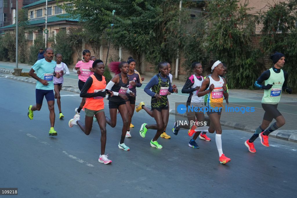 SRINAGAR, INDIA - OCTOBER 25, 2026: Participants run during the third edition of the Kashmir International Marathon in Srinagar, Jammu and Kashmir. Runners, including international athletes from 12 countries, take part in the event, which features a 42.195-kilometre full marathon and a 21-kilometre half marathon. The routes pass through scenic locations, including Dal Lake, Boulevard Road and Nishat Garden, highlighting Kashmir's natural beauty and growing potential for sports tourism. (Photo by Sameer Hussain/JNA Press via Nexpher Images)