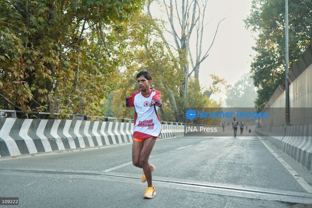SRINAGAR, INDIA - OCTOBER 25, 2026: Participants run during the third edition of the Kashmir International Marathon in Srinagar, Jammu and Kashmir. Runners, including international athletes from 12 countries, take part in the event, which features a 42.195-kilometre full marathon and a 21-kilometre half marathon. The routes pass through scenic locations, including Dal Lake, Boulevard Road and Nishat Garden, highlighting Kashmir's natural beauty and growing potential for sports tourism. (Photo by Sameer Hussain/JNA Press via Nexpher Images)