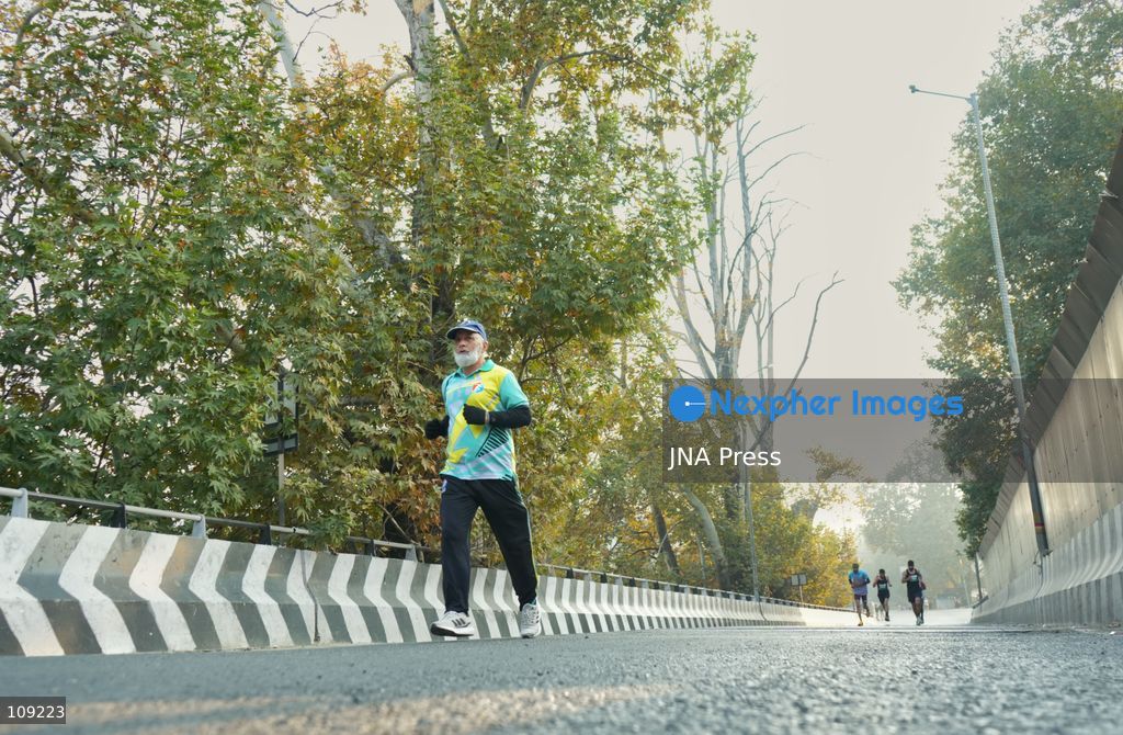 SRINAGAR, INDIA - OCTOBER 25, 2026: Participants run during the third edition of the Kashmir International Marathon in Srinagar, Jammu and Kashmir. Runners, including international athletes from 12 countries, take part in the event, which features a 42.195-kilometre full marathon and a 21-kilometre half marathon. The routes pass through scenic locations, including Dal Lake, Boulevard Road and Nishat Garden, highlighting Kashmir's natural beauty and growing potential for sports tourism. (Photo by Sameer Hussain/JNA Press via Nexpher Images)