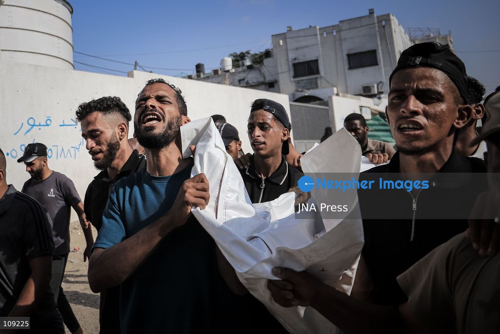 GAZA, PALESTINE - OCTOBER 25, 2026: Palestinians bid farewell to three men who were killed in an Israeli airstrike that targeted the Islamic University in Gaza City on Sunday evening. Skaik / JNA PRESS (Photo by Mohammed M Skaik/JNA Press via Nexpher Images)