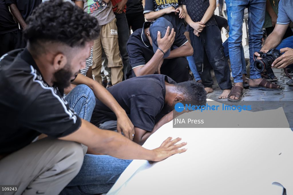 GAZA, PALESTINE - OCTOBER 25, 2026: Palestinians bid farewell to three men who were killed in an Israeli airstrike that targeted the Islamic University in Gaza City on Sunday evening. Skaik / JNA PRESS (Photo by Mohammed M Skaik/JNA Press via Nexpher Images)