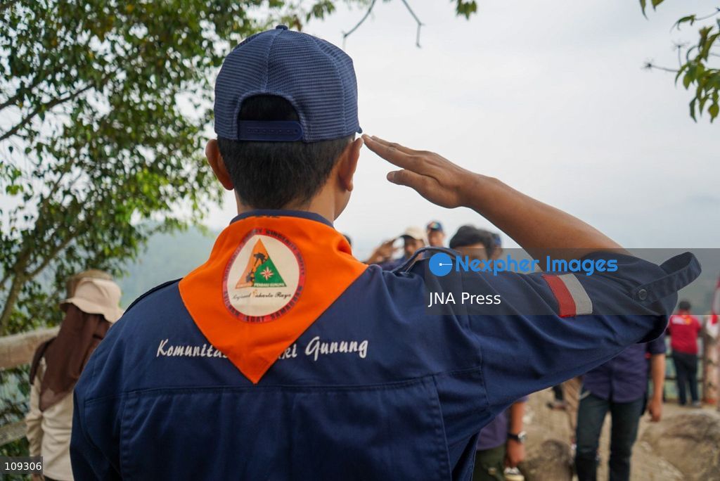 BANDUNG, INDONESIA - OCTOBER 25, 2026: Members of the Mountain Climbers Community (KPG) held a ceremony ahead of Youth Pledge Day (Hari Sumpah Pemuda) at Tebing Keraton in Bandung, West Java. Following the flag unfurling the previous day, participants gathered for a formal ceremony and recited the Youth Pledge to promote national unity and environmental awareness among young people. (Photo by Dennis Joel Putra/JNA Press via Nexpher Images)