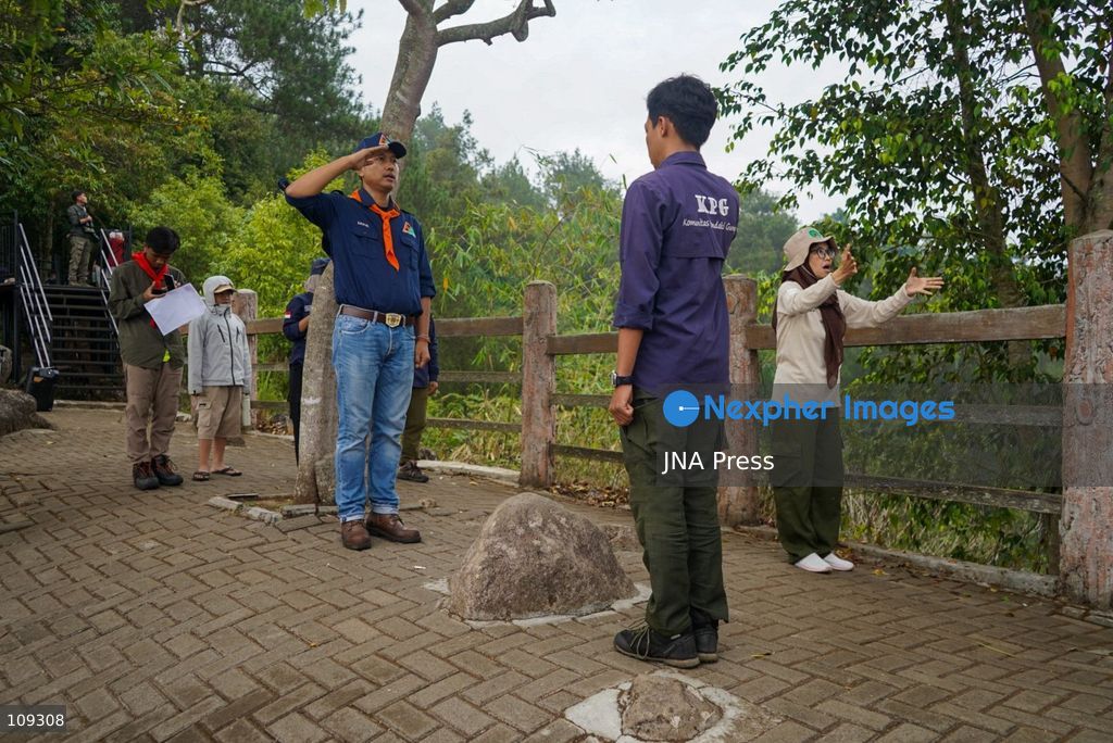 BANDUNG, INDONESIA - OCTOBER 25, 2026: Members of the Mountain Climbers Community (KPG) held a ceremony ahead of Youth Pledge Day (Hari Sumpah Pemuda) at Tebing Keraton in Bandung, West Java. Following the flag unfurling the previous day, participants gathered for a formal ceremony and recited the Youth Pledge to promote national unity and environmental awareness among young people. (Photo by Dennis Joel Putra/JNA Press via Nexpher Images)