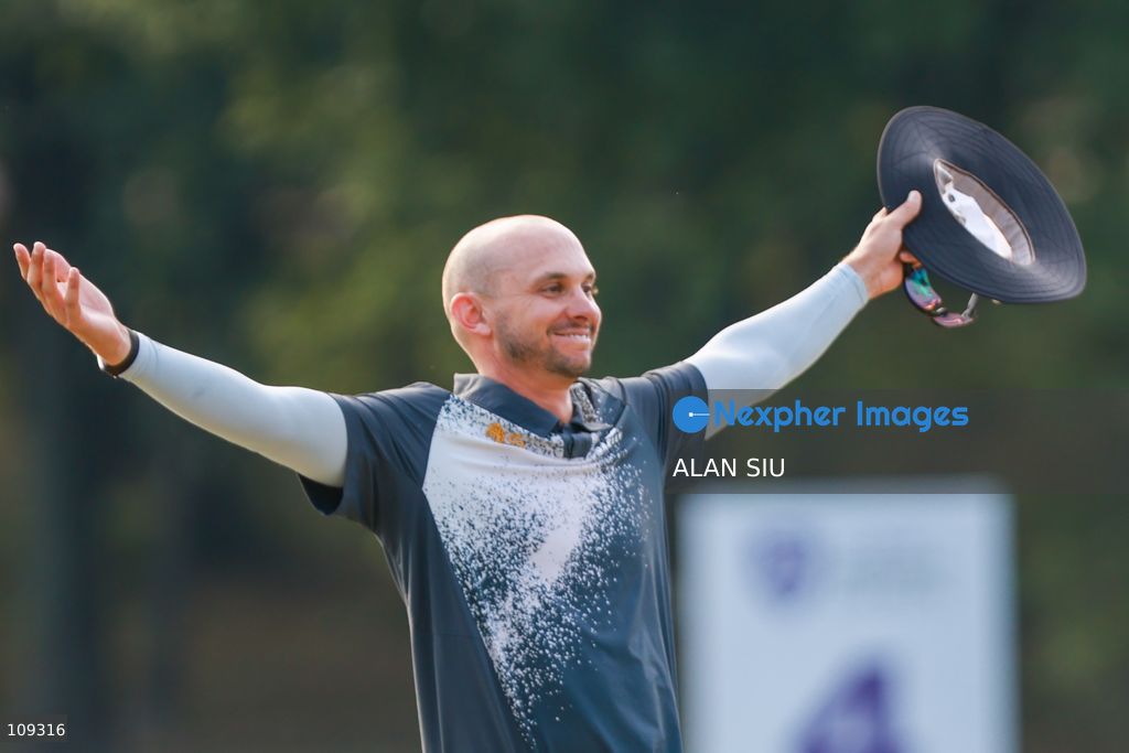 John Catlin of USA poses with trophy after winning The Link Hong Kong Open at the Hong Kong Golf Club in Faning on October 25, 2026 in Hong Kong. (Photo by ALAN SIU/Nexpher Images)