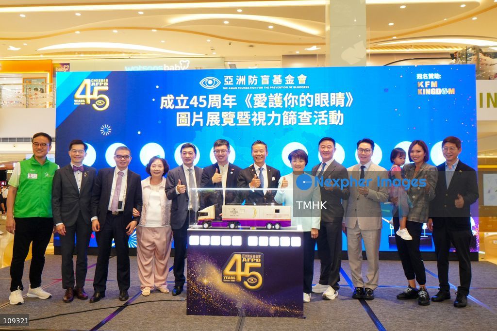 Hong Kong Under Secretary for Labour and Welfare Ho Kai-ming, Legislative Council member Christine Fong Kwok-shan and other guests pose for photographs on stage during the 45th anniversary photo exhibition and vision screening event organised by the Asian Foundation for the Prevention of Blindness at East Point City in Tseung Kwan O, Hong Kong, on October 24, 2026. (Photo by Zulu Lo/TMHK via Nexpher Images)