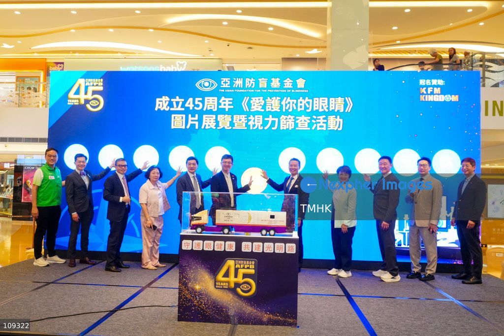 Hong Kong Under Secretary for Labour and Welfare Ho Kai-ming, Legislative Council member Christine Fong Kwok-shan and other guests pose for photographs on stage during the 45th anniversary photo exhibition and vision screening event organised by the Asian Foundation for the Prevention of Blindness at East Point City in Tseung Kwan O, Hong Kong, on October 24, 2026. (Photo by Zulu Lo/TMHK via Nexpher Images)