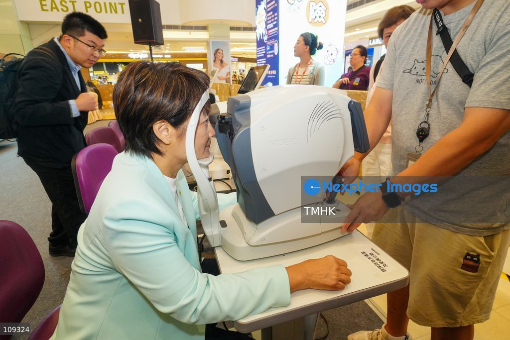 Hong Kong Legislative Council member Christine Fong Kwok-shan undergoes an eye examination during the 45th anniversary photo exhibition and vision screening event organised by the Asian Foundation for the Prevention of Blindness at East Point City in Tseung Kwan O, Hong Kong, on October 24, 2026. The event aims to promote eye health awareness and encourage early detection of eye diseases. (Photo by Zulu Lo/TMHK via Nexpher Images)