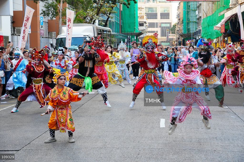 A general view of a traditional Yingge dance street parade during the Chaozhou Night Market festival in Kowloon City, Hong Kong, on October 24, 2026. The three-day event features Chaozhou cultural performances, traditional crafts and food stalls to promote Chaozhou heritage. (Photo by Zulu Lo/TMHK via Nexpher Images)