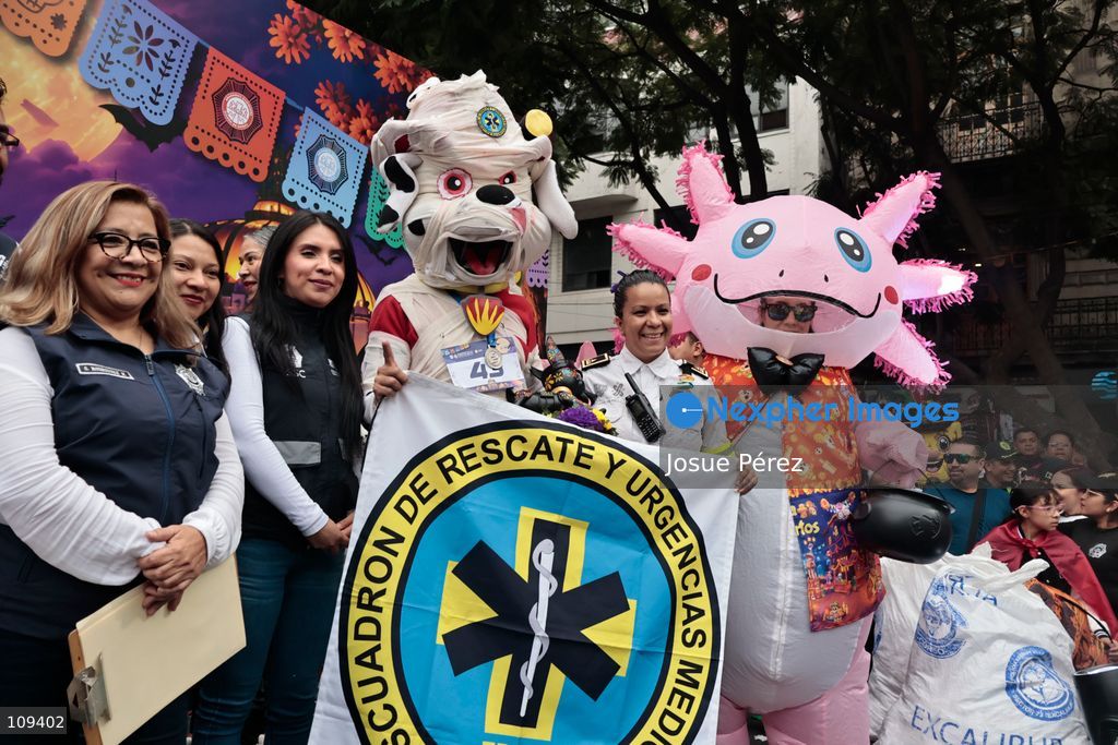 Participants posing for a photo on October 24, 2026, in Mexico City, Mexico.The Mexico City Secretariat of Citizen Security held its second annual Mascot Race, which took place as part of the Day of the Dead festivities. The 52 competitors wore oversized costumes to race along one of the city’s main avenues, delighting the attendees who enjoyed watching these mascots dash toward victory. (Photo by Josue Pérez/Nexpher Images)