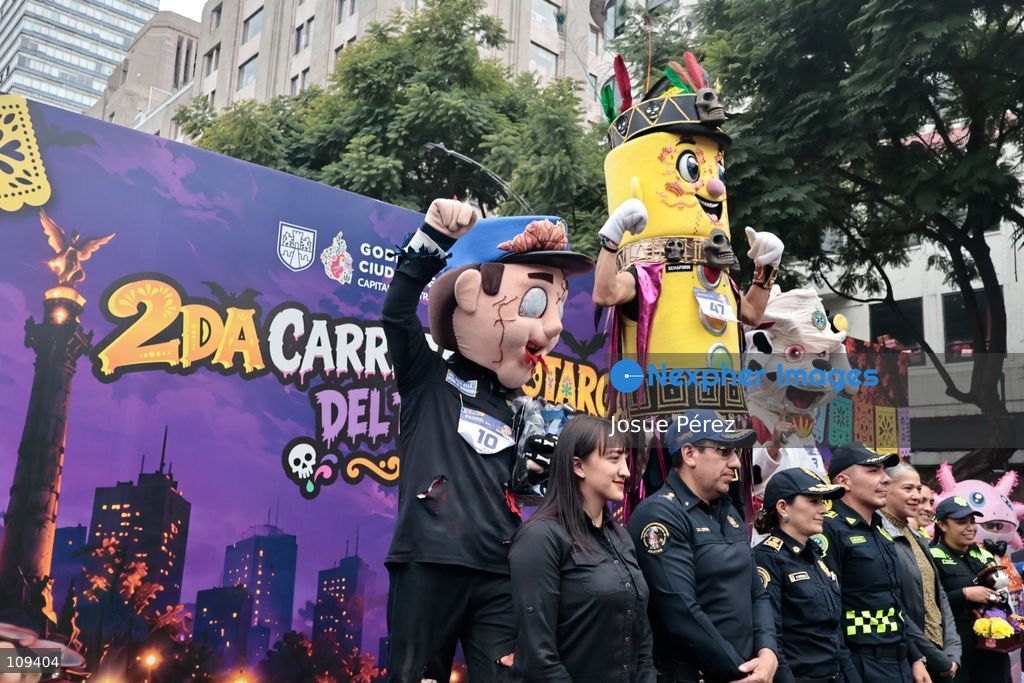 Semaforin was the winner of the second mascot race on October 24, 2026, in Mexico City, Mexico. The Mexico City Secretariat of Citizen Security held its second annual Mascot Race, which took place as part of the Day of the Dead festivities. The 52 competitors wore oversized costumes to race along one of the city’s main avenues, delighting the attendees who enjoyed watching these mascots dash toward victory. (Photo by Josue Pérez/Nexpher Images)