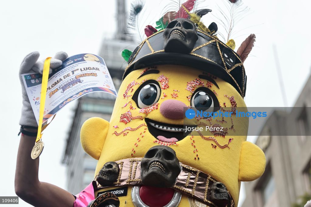 Semaforin was the winner of the second mascot race on October 24, 2026, in Mexico City, Mexico. The Mexico City Secretariat of Citizen Security held its second annual Mascot Race, which took place as part of the Day of the Dead festivities. The 52 competitors wore oversized costumes to race along one of the city’s main avenues, delighting the attendees who enjoyed watching these mascots dash toward victory. (Photo by Josue Pérez/Nexpher Images)